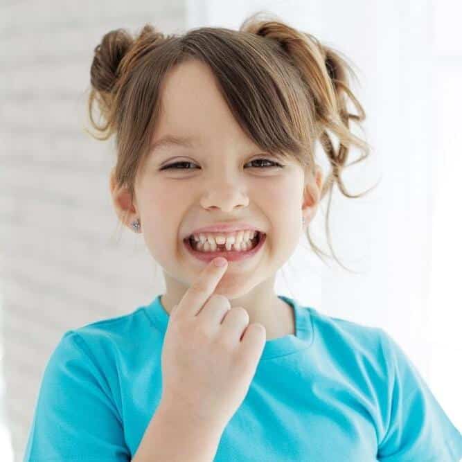 Dientes de leche flojos o retenidos